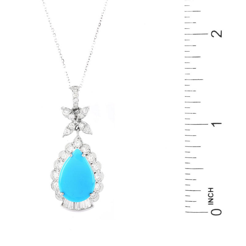 Approx. 3.80 Carat Oval Cabochon Persian Turquoise, .90 Carat Round Brilliant Cut and Baguette Cut Diamond and 18 Karat White Gold Pendant.