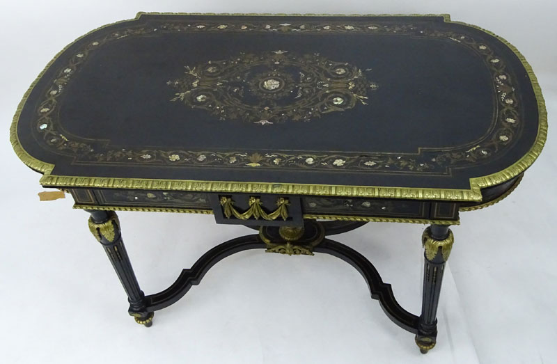 American Renaissance Gilt Bronze Mounted Mother of Pearl and Ebonized Library Table. Circa 1860.