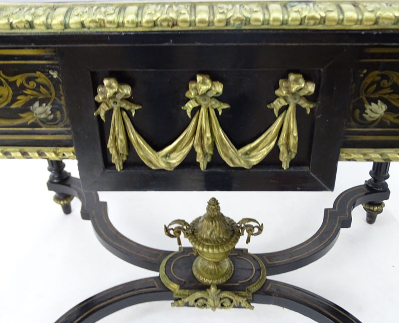 American Renaissance Gilt Bronze Mounted Mother of Pearl and Ebonized Library Table. Circa 1860.