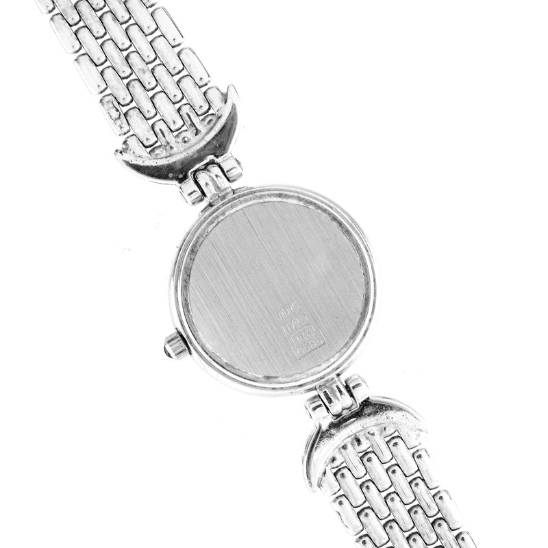 Lady's Vintage Geneve Supreme Diamond and 14 Karat White Gold Bracelet Watch with Quartz Movement.