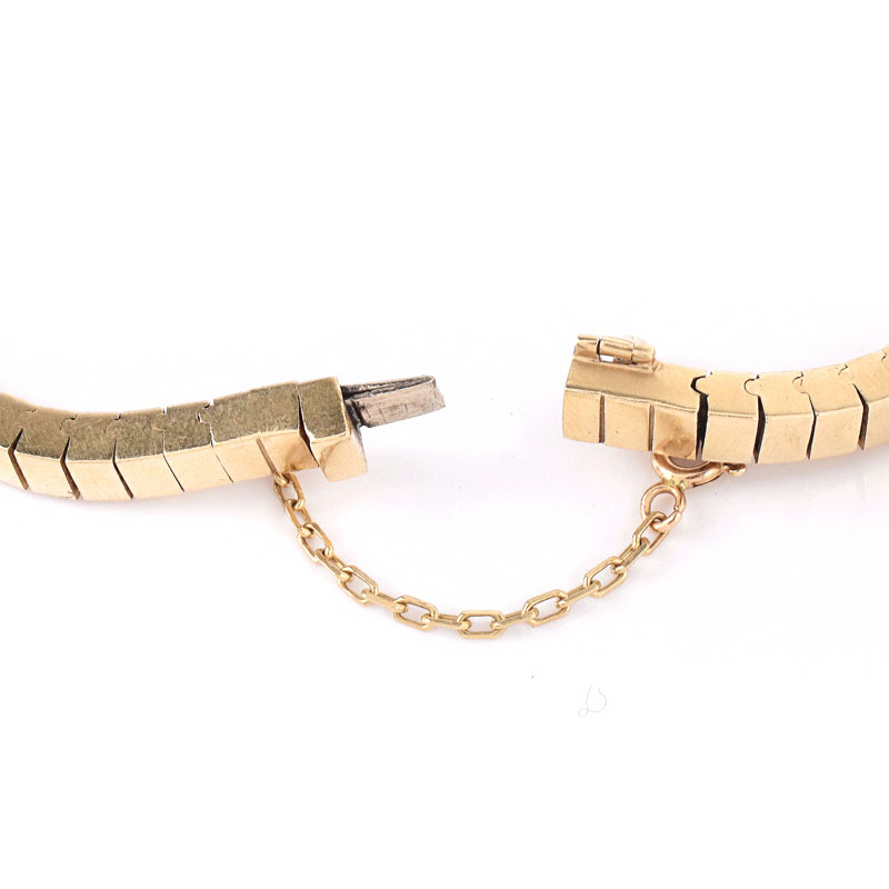 Vintage 14 Karat Yellow Gold Bracelet with Small Round Cut Diamonds. Stamped 14K. Surface wear from normal use.