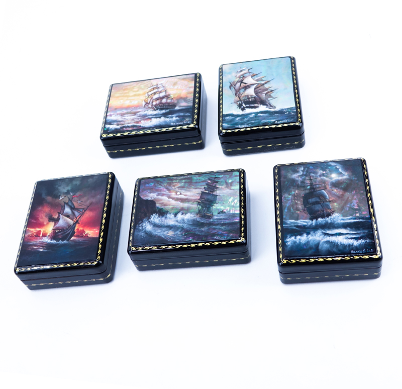 A Group of Five (5) Russian Lacquer Paper Mache Boxes. Signed to top. All depicting nautical scenes.