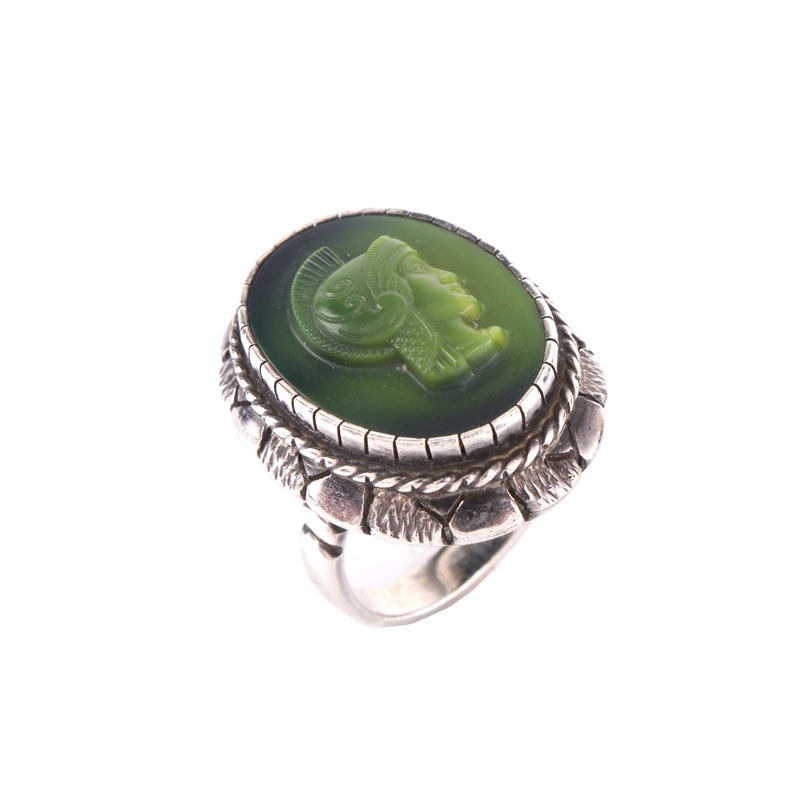 Italian Sterling Silver Bead Multi-strand Necklace, a Sterling Silver and Carved Green Stone Cameo Ring and a Sterling Silver Ring. 