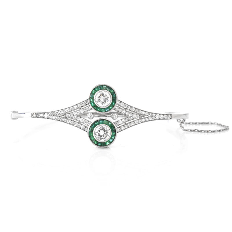 Art Deco style Approx. 2.50 Carat TW Diamond, Emerald and 18 Karat White Gold Hinged Bangle Bracelet. 