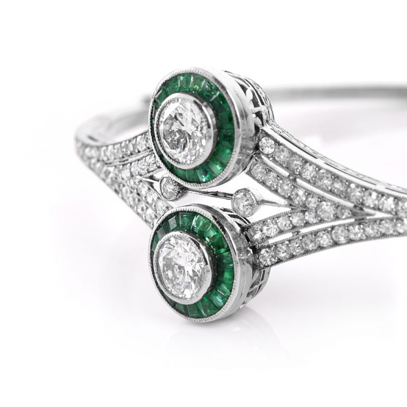 Art Deco style Approx. 2.50 Carat TW Diamond, Emerald and 18 Karat White Gold Hinged Bangle Bracelet. 