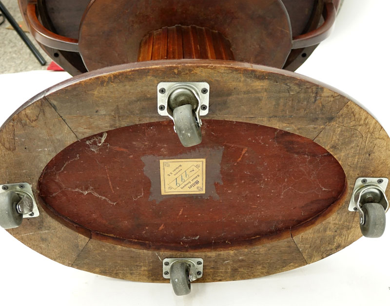 Antique Miller Cabinet Co. Mahogany Inlaid Oval Table on Wheels. Miller Cabinet Co., Rochester, N.Y. No. 