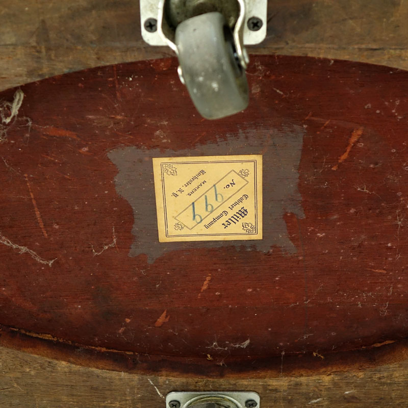 Antique Miller Cabinet Co. Mahogany Inlaid Oval Table on Wheels. Miller Cabinet Co., Rochester, N.Y. No. 