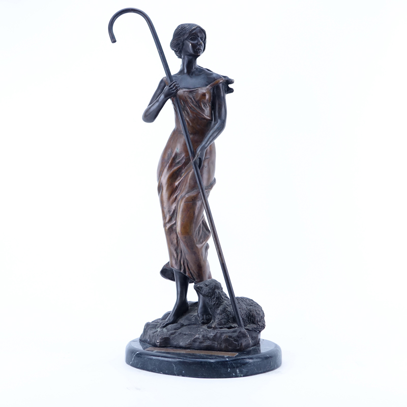 Modern Colombian Bronze Figure Of A Woman With A Staff And Lamb. Unsigned. Good condition. Measures 25" H.