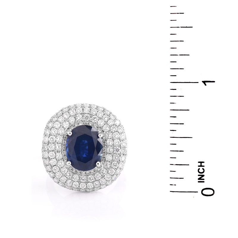 Approx. 4.0 Carat Oval Cut Sapphire, 3.25 Carat Pave Set Round Brilliant Cut Diamond and 18 karat White Gold Ring.