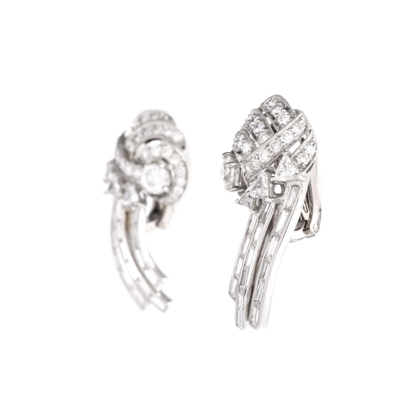 Approx. 5.50 Carat Round Brilliant, Trillion and Baguette Cut Diamond and Platinum Earrings.