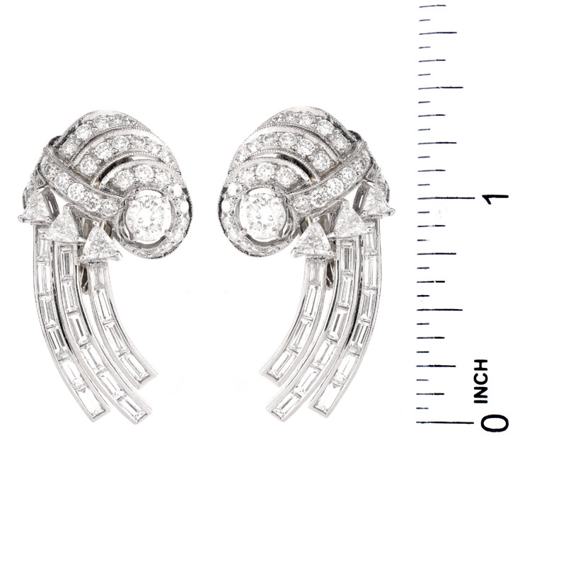 Approx. 5.50 Carat Round Brilliant, Trillion and Baguette Cut Diamond and Platinum Earrings.