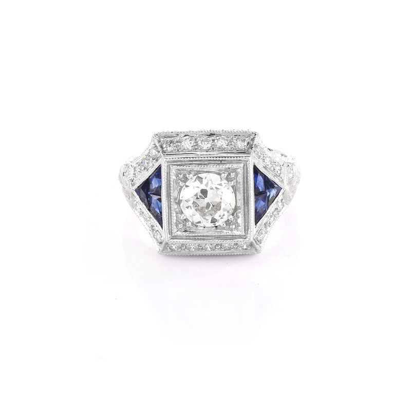 Art Deco style Approx. 1.16 Carat TW Diamond, .50 Carat Sapphire and Platinum Ring set in the Center with a .84 Carat Round Brilliant Cut Diamond.