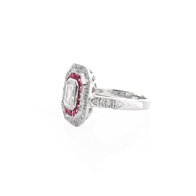 Art Deco style Approx. 1.56 Carat TW Diamond, .60 Carat Ruby and Platinum Ring set in the Center with a 1.21 Carat Emerald Cut Diamond.