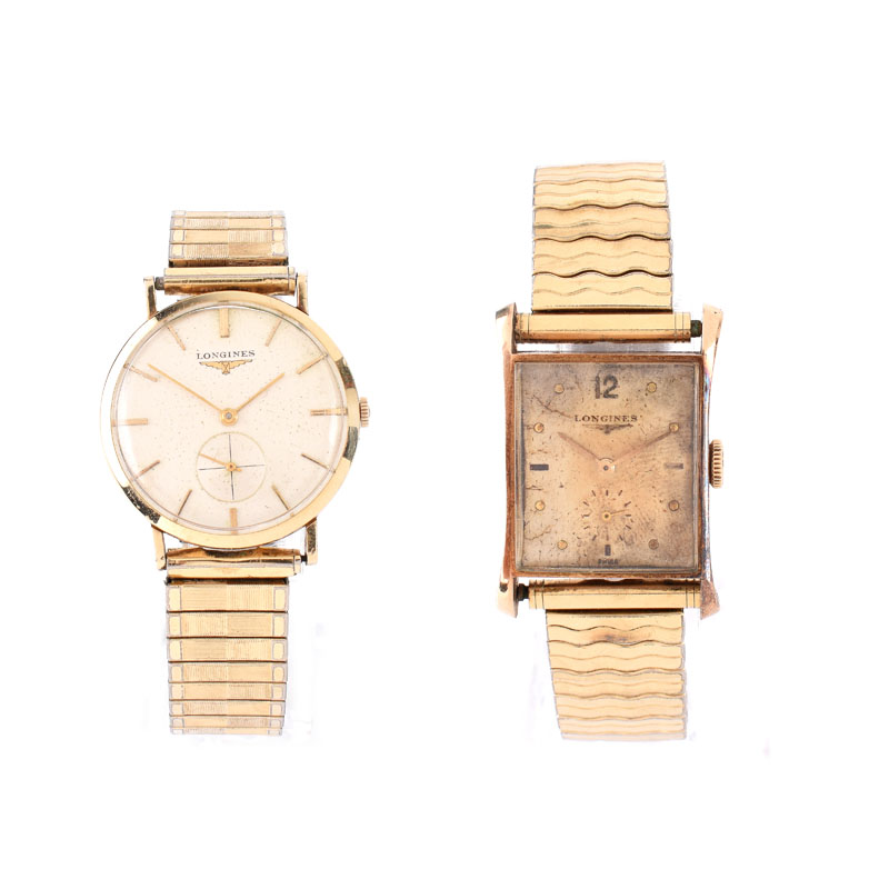 Two (2) Vintage Men's Longines Watches Including a 14 Karat Yellow Gold Tank style watch with Manual Movement and a 14 Karat yellow Gold Filled Round Dial with Manual Movement.