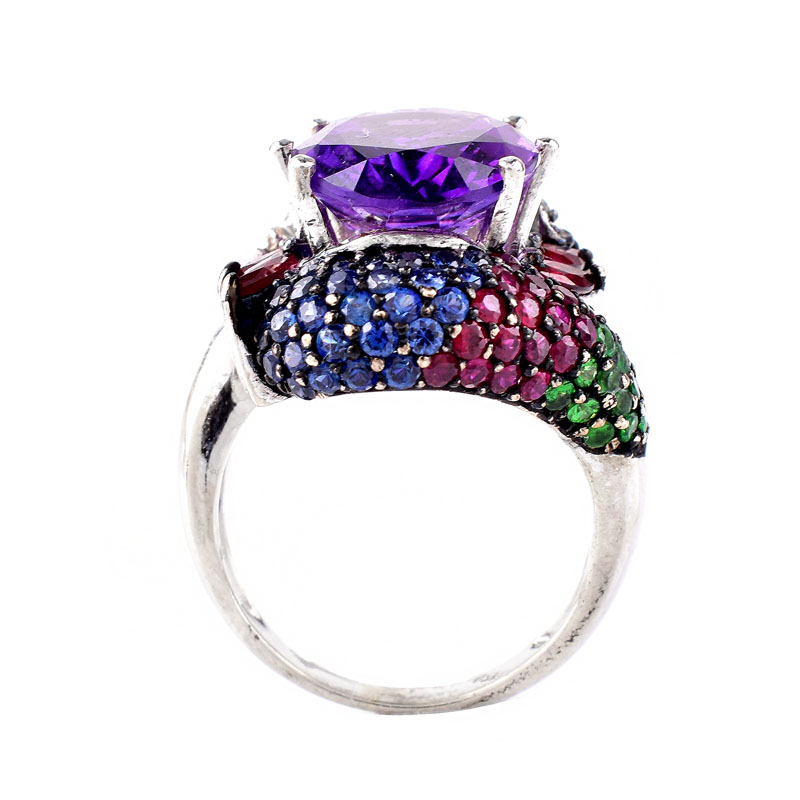 Vintage Approx. 8.70 Carat Oval Cut Amethyst, Pave Set Emerald, Sapphire and Ruby, Marquise Cut Ruby, Diamond and 18 Karat White Gold Ring. 