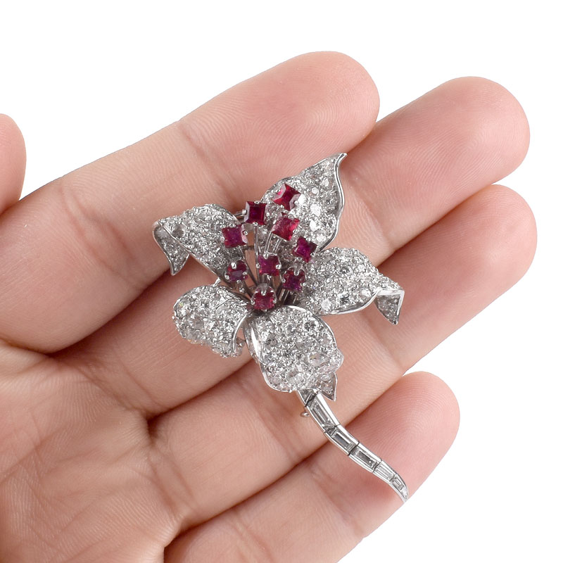 Vintage David Webb Approx. 6.50 Carat Pave Set Round Brilliant and Baguette Cut Diamond, Square Cut Ruby and Platinum Flower Brooch with Articulated Stem. 