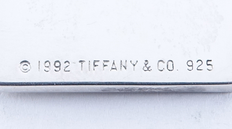 Tiffany & Co 'Ace of Hearts' Sterling Silver  Key Chain with Original Pouch. Signed and stamped 925 on charm and hoop.