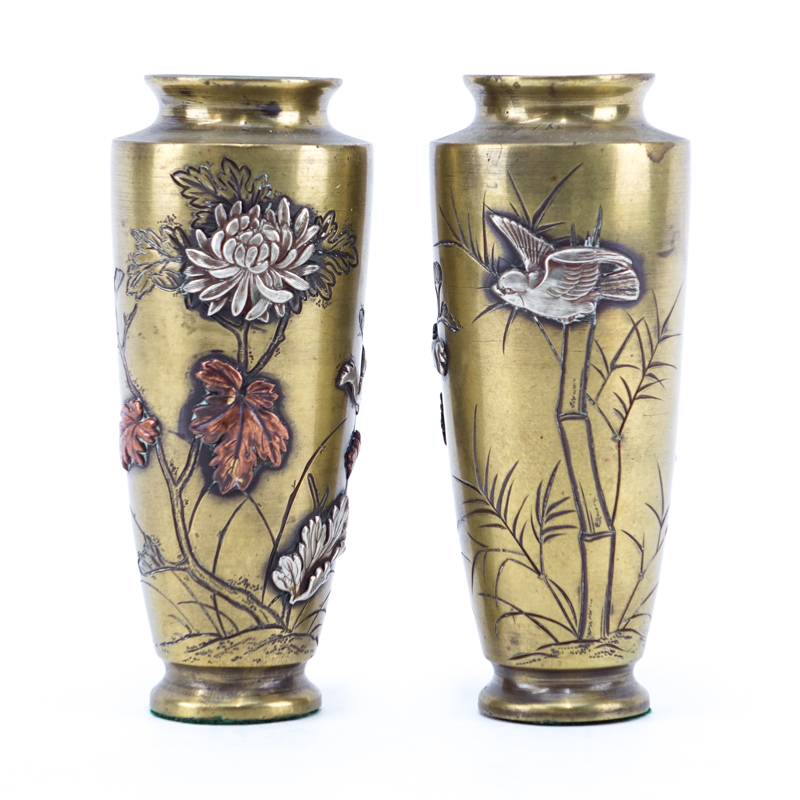 Pair of Japanese Gilt Bronze Mixed Metal Vases with Raised Flower and Bird Relief.