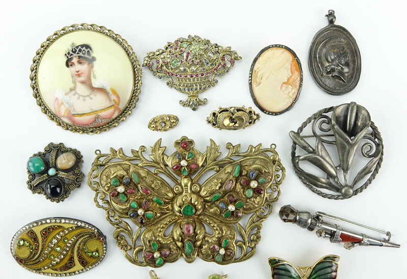 Lot of Thirteen (13) Vintage Costume Jewelry. Includes: assorted bejewelled Pins/brooches, pins, pendant, and earring.