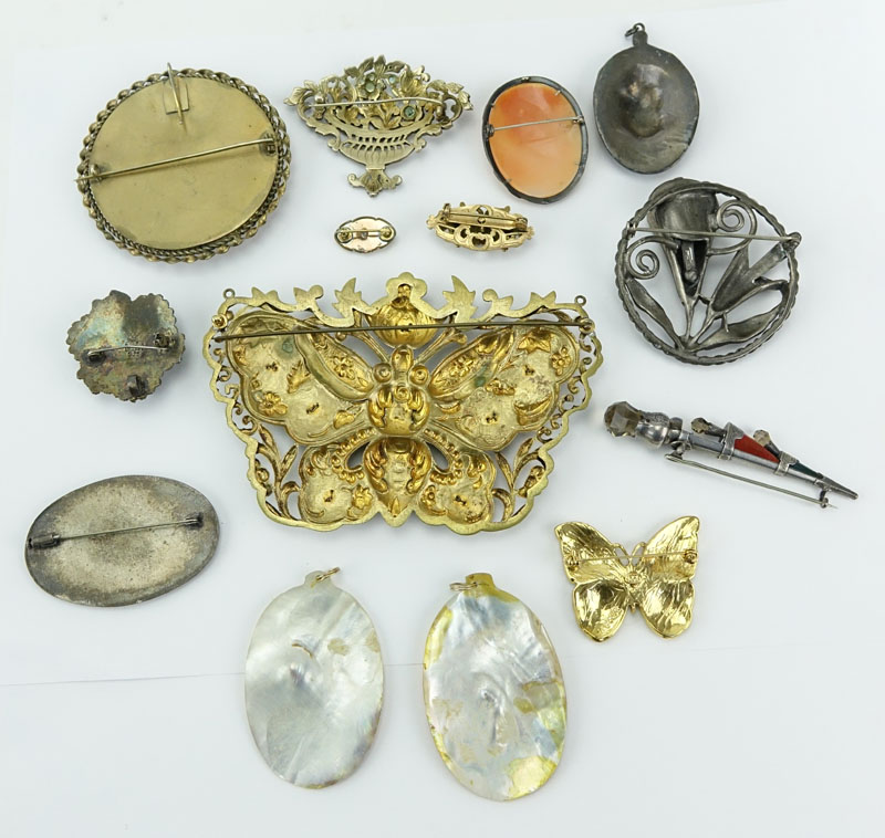 Lot of Thirteen (13) Vintage Costume Jewelry. Includes: assorted bejewelled Pins/brooches, pins, pendant, and earring.