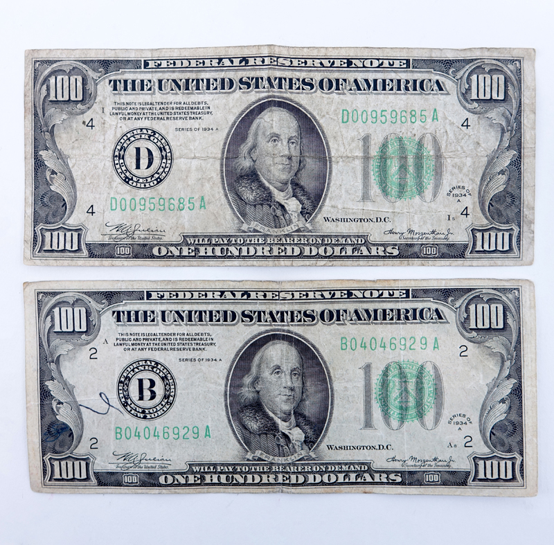 Two (2) U.S $100 Federal Reserve Notes, Series of 1934A. Signed: Julian - Morgenthau. 