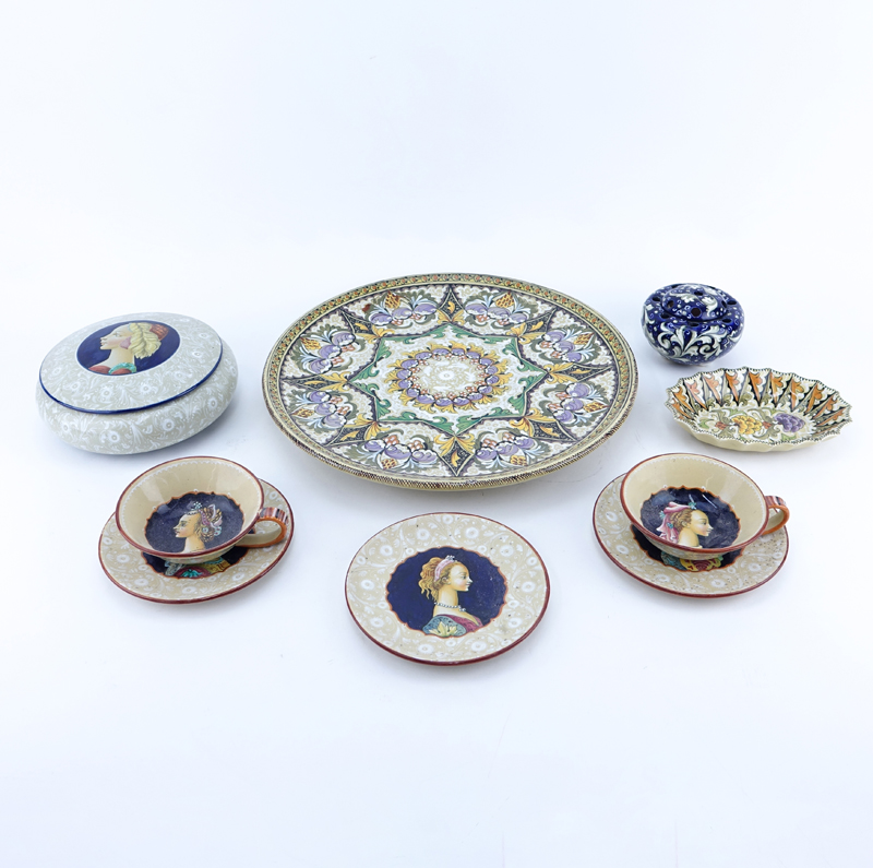 Grouping of Nine (9) Italian Majolica Ceramic Table Top Items. Includes: large charger, round covered box, covered round potpourri box, three plates, 2 cups, and small dish. 