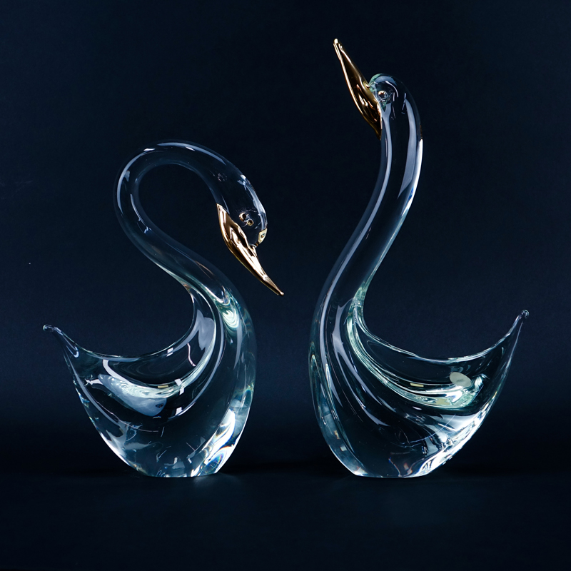 Two (2) Murano Art Glass and Gilt Painted  Swan Sculptures. Original label attached to one sculpture.