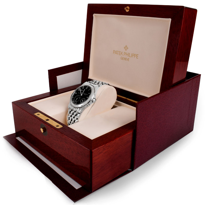 Man's Circa 1999 Patek Philippe Power Reserve Moonphase 5095/1A Stainless Steel Bracelet Watch with Skeleton Case Back, Box and Papers. 