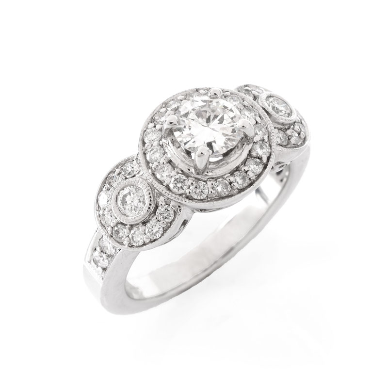 Approx. 1.40 Carat Diamond and 18 Karat White Gold Engagement Ring. Set in the center with a round brilliant cut diamond.