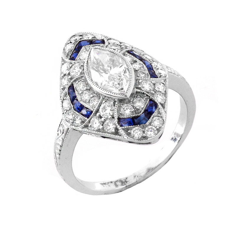 Art Deco style Approx. 1.61 Carat TW Diamond, 1.44 Carat Sapphire and Platinum Ring set in the Center with a 1.02 Carat Marquise Cut Diamond. 
