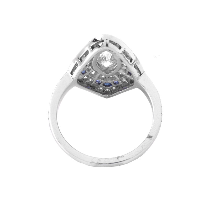 Art Deco style Approx. 1.61 Carat TW Diamond, 1.44 Carat Sapphire and Platinum Ring set in the Center with a 1.02 Carat Marquise Cut Diamond. 