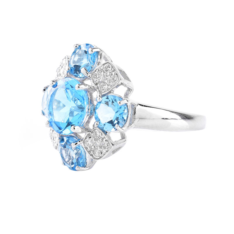 Approx. 4.86 Carat Round Cut London Topaz, Diamond and 18 Karat White Gold Ring. Topaz with vivid color. 