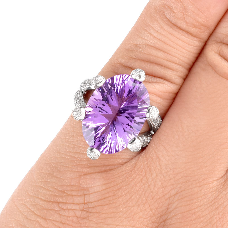 Oval Cut Amethyst, Approx. 1.50 Carat Pave Set Round Brilliant Cut Diamond and 14 Karat White Gold Ring.