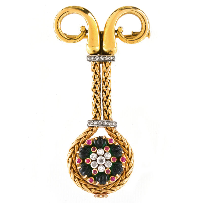 Circa 1940s 14 Karat Yellow Gold, Carved Emerald Bead, Ruby and Diamond Pendant Watch. Unsigned.