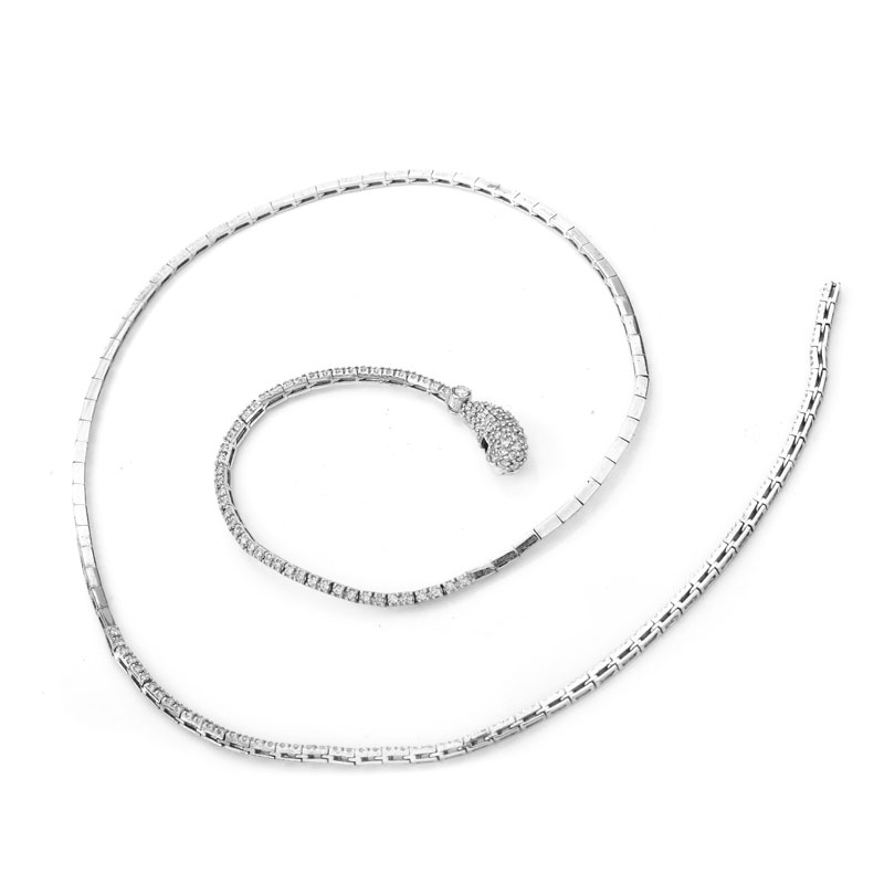 Vintage Micro Pave Set Diamond and 14 Karat White Gold Articulated Snake Lariat Necklace. Stamped 14K.