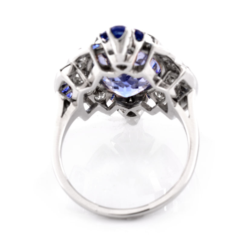 Art Deco Oval Cut Sapphire, Approx. 1.0 Carat Round Brilliant Cut Diamond and Platinum Ring. Diamonds G-H color, VS1 clarity.