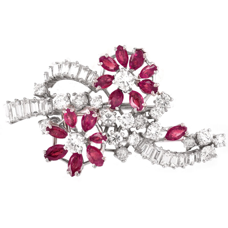 Vintage Round Brilliant and Baguette Cut Diamond, Oval Cut Ruby and Platinum Brooch. Fine quality stones throughout.
