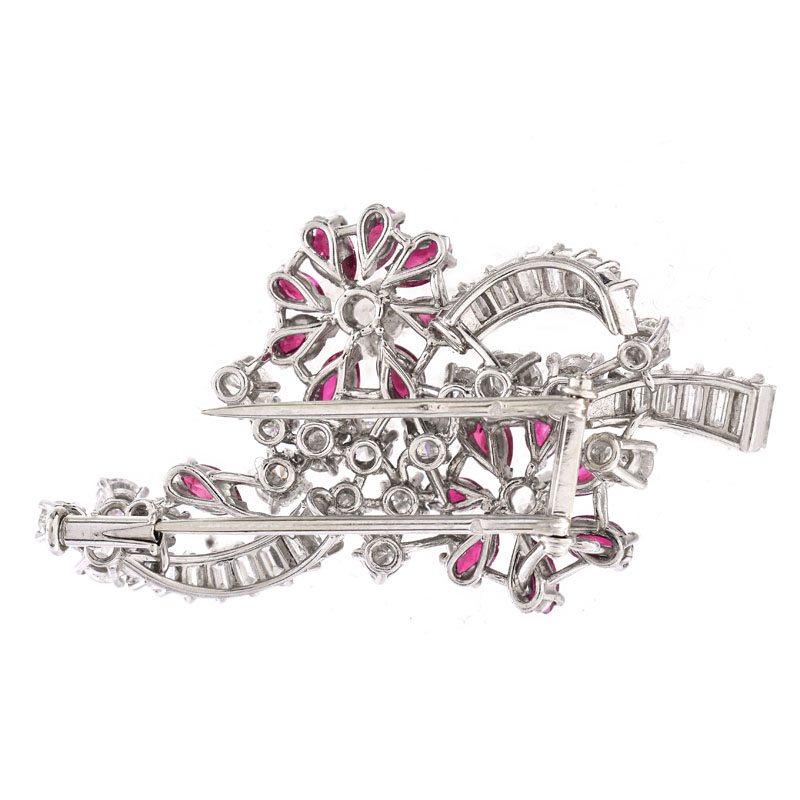 Vintage Round Brilliant and Baguette Cut Diamond, Oval Cut Ruby and Platinum Brooch. Fine quality stones throughout.