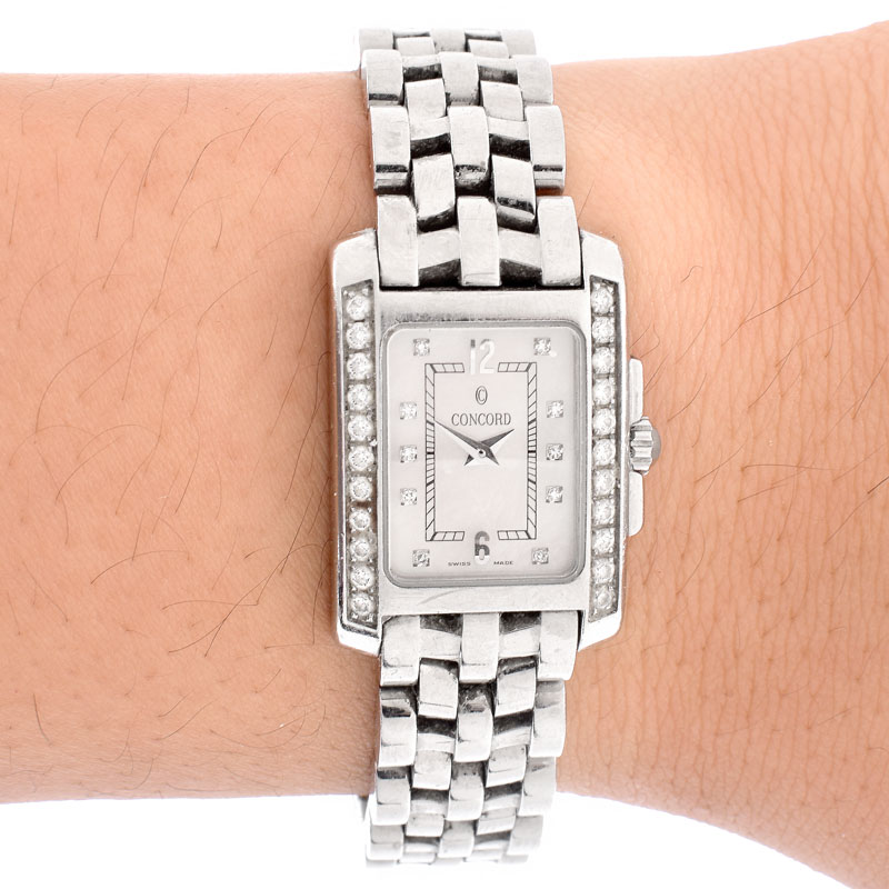 Lady's Vintage Concord Sportivo Stainless Steel Bracelet Watch with Diamond Bezel, Mother of Pearl Dial and Quartz Movement.