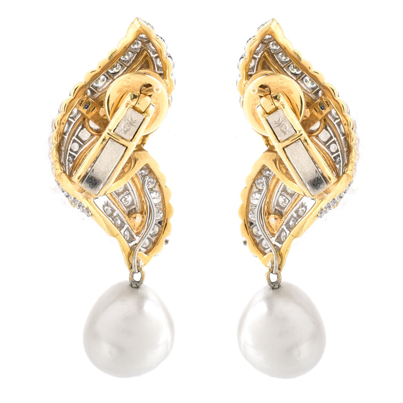 Approx. 5.50 Carat Round Brilliant Cut Diamond, Baroque Pearl and 18 Karat Yellow Gold Earrings. Diamonds F-G color, VS1-VS2 clarity.