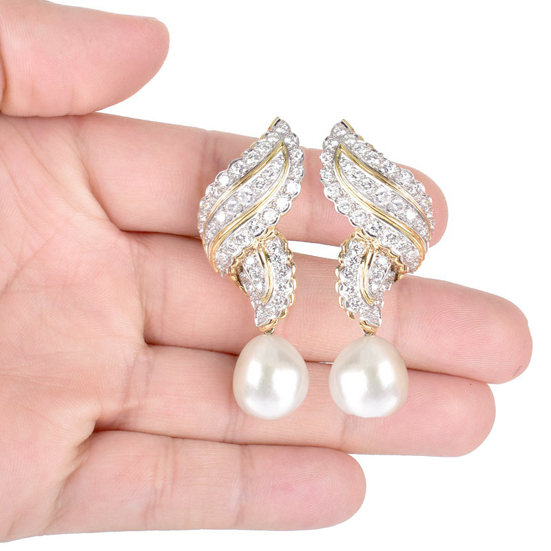 Approx. 5.50 Carat Round Brilliant Cut Diamond, Baroque Pearl and 18 Karat Yellow Gold Earrings. Diamonds F-G color, VS1-VS2 clarity.