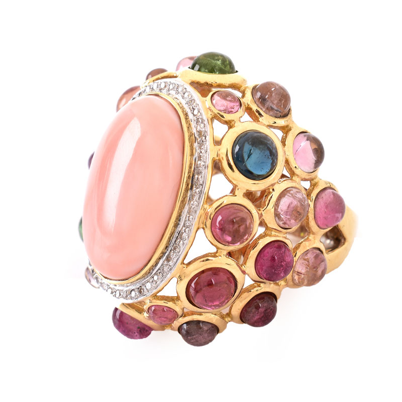 Vintage Angel Skin Coral, Cabochon Tourmaline,  Diamond and 14 Karat Yellow Gold Ring. Coral measures 19mm x 14mm.