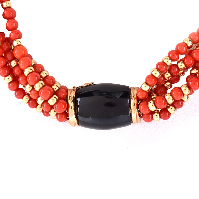 Vintage Red Coral and 14 Karat Yellow Gold Bead Multi Strand Necklace with Onyx and 14 Karat yellow Gold Clasp.