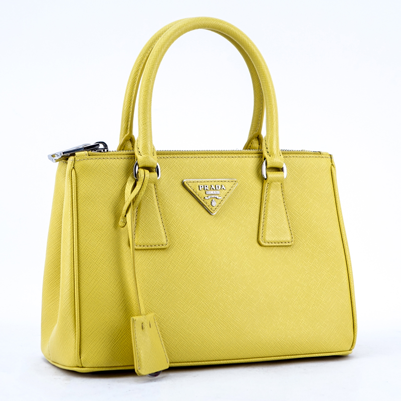 Prada Yellow Small Grained Leather Saffiano Lux Handbag. | Kodner Auctions