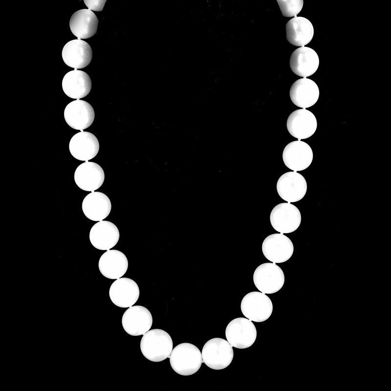 Single Strand Thirty Three (32) 12-14mm South Sea Pearl Necklace with 14 Karat White Gold and Diamond Clasp.
