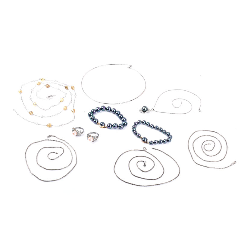 Collection of Sterling Silver Jewelry Including Six (6) Necklaces (two with faux diamonds), Two (2) Rings with Pearls, Two (2) Black Pearl Bracelets.