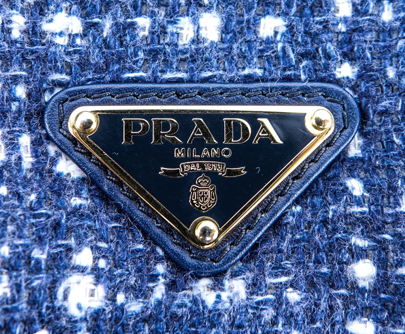 Prada Blue and White Tweed Flap Bag. Black lucite chain and hardware. Blue and pink leather interior with zipper pocket.