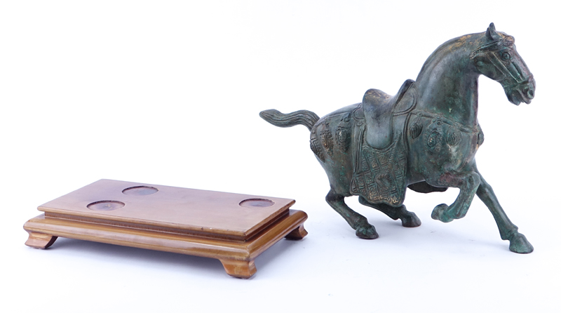 Chinese Tang Dynasty Style Patinated Bronze Model of a Horse on Wooden Stand.