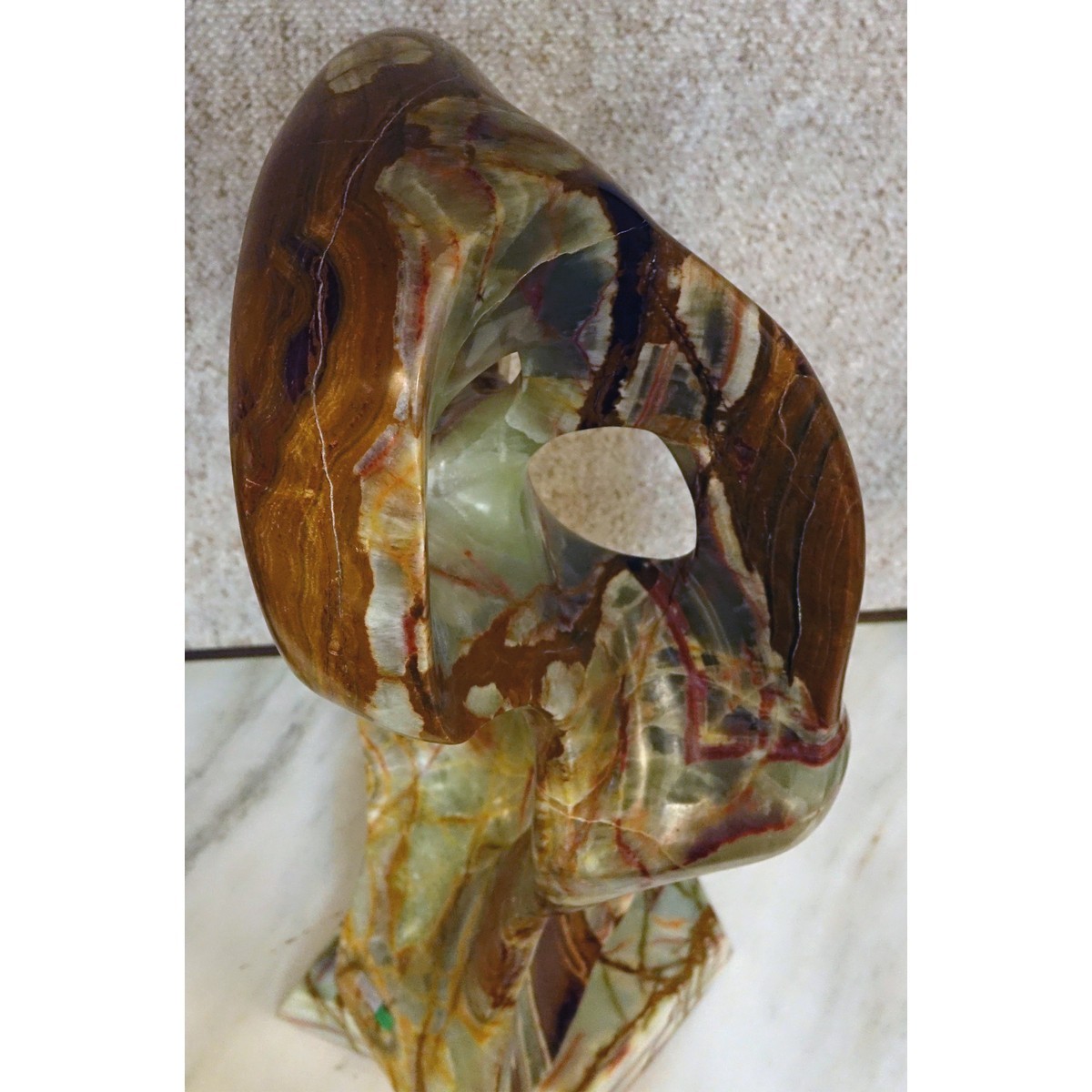 Large Carved Onyx Abstract-Free Form Sculpture on Matching Base Signed Bernie M. Good condition.