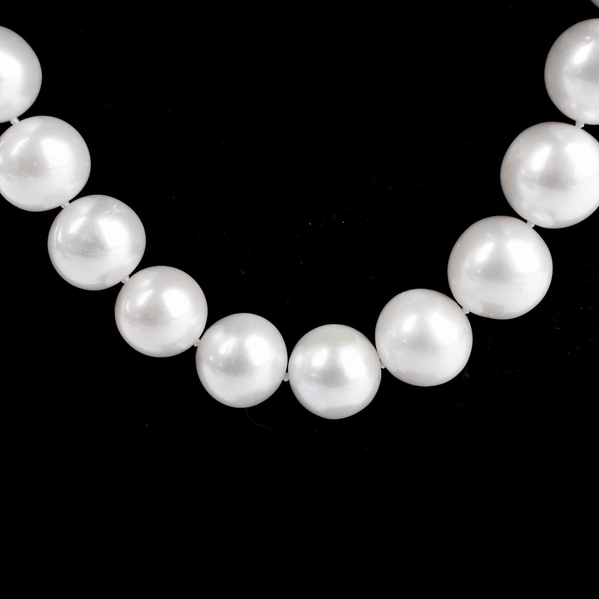 Single Strand 13.0-15.0mm South Sea White Pearl Necklace with 14 Karat Yellow Gold and Diamond Clasp. Clasp stamped 585.